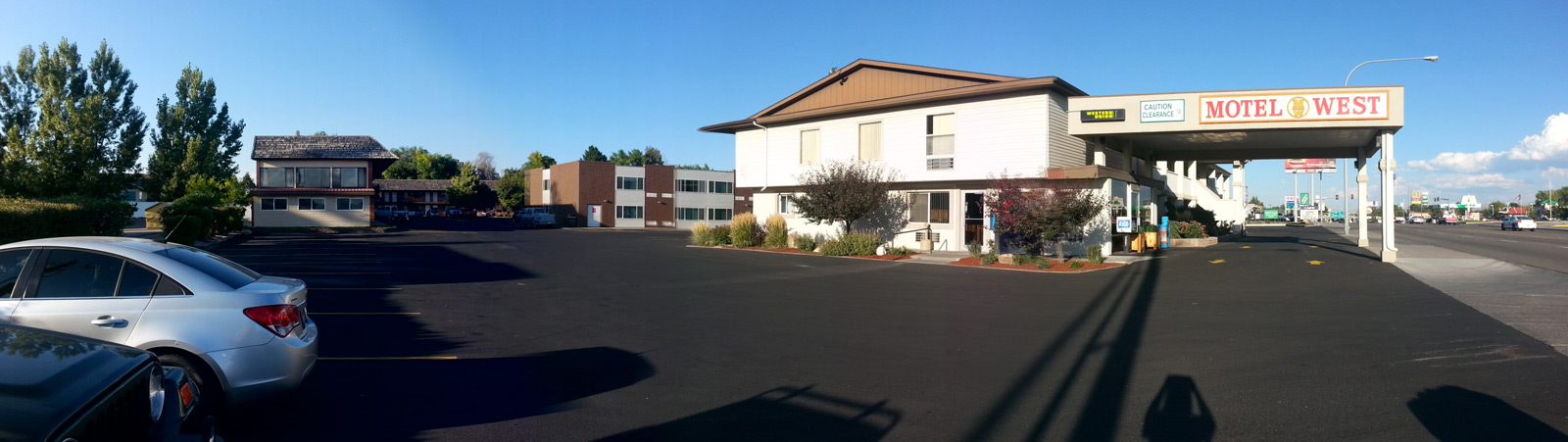 Hotel West buildings and parking lot.